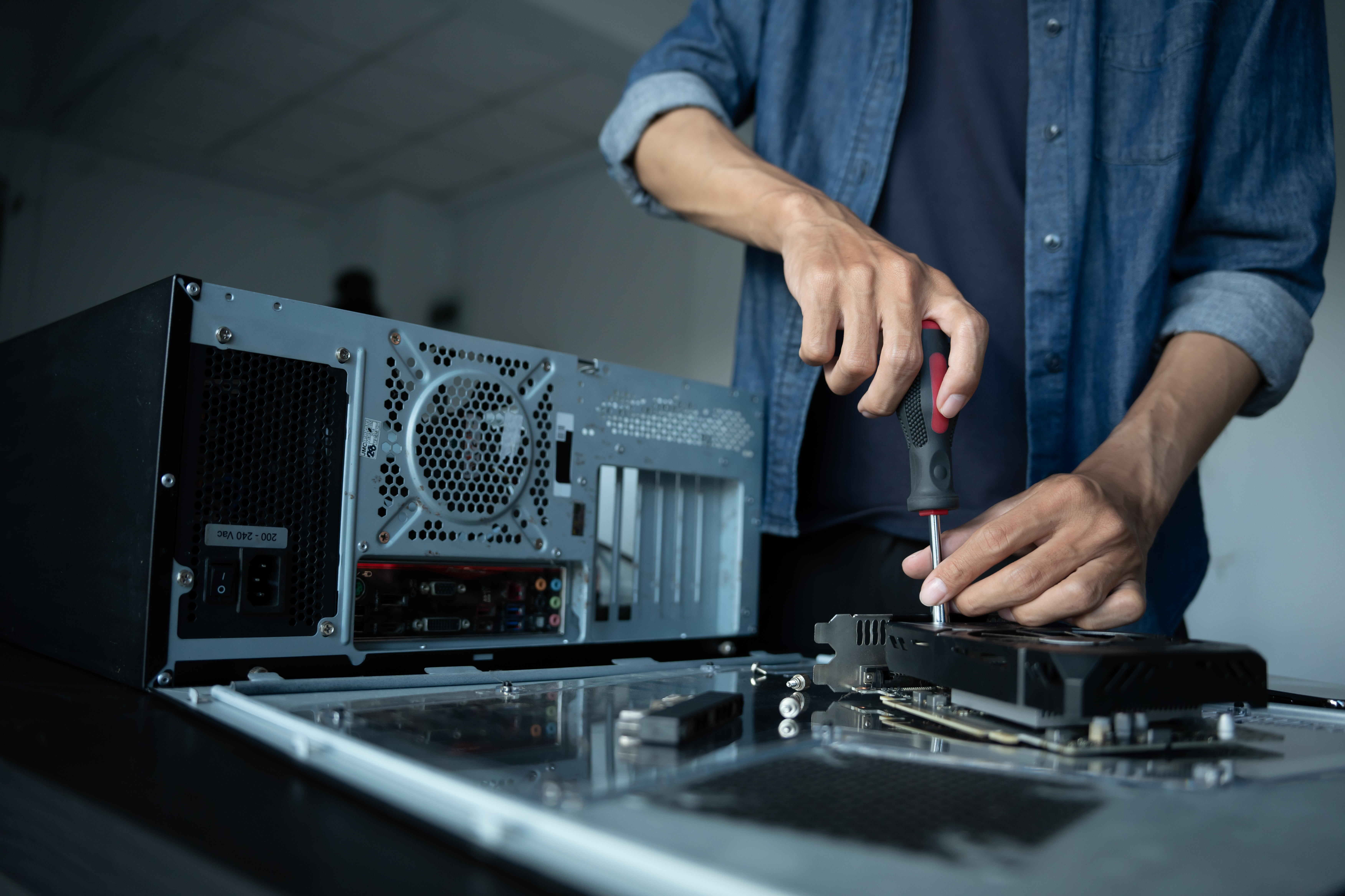 IT Engineer installing Hardware Equipment Development Facility Engineer Maintenance computer Motherboard Electronic repair shop technology business.